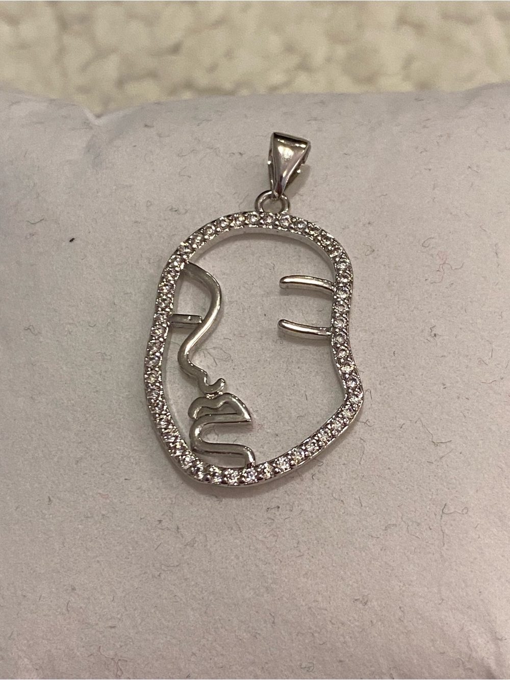 Silver Face Outline Pendant with Cubic Zirconia Accents